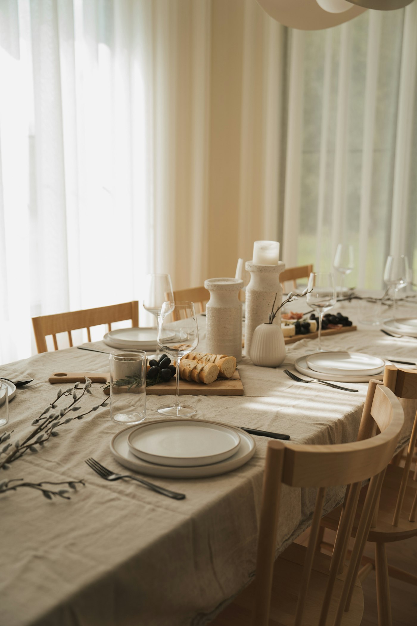A plated meal with a glass of wine at a restaurant table